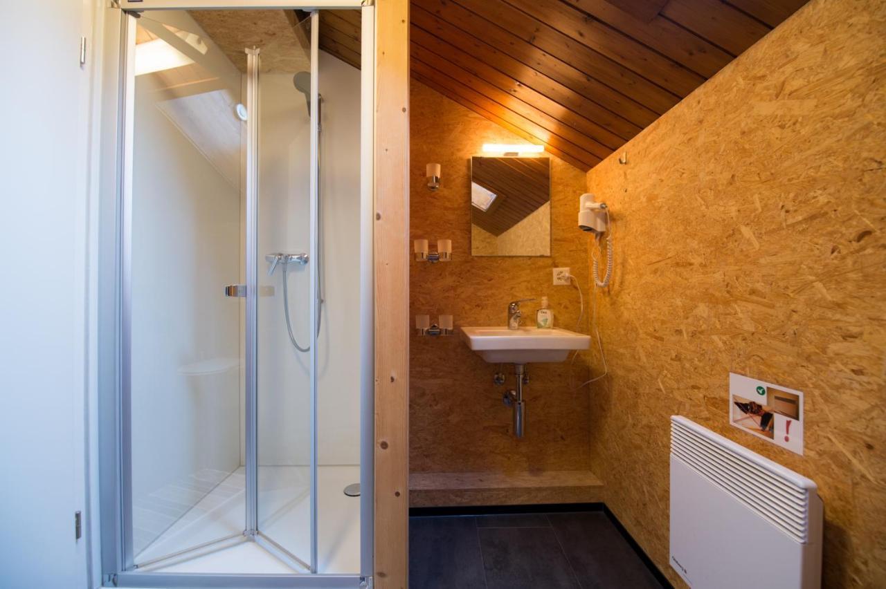 Sust Lodge Am Gotthard Hospental Habitación foto